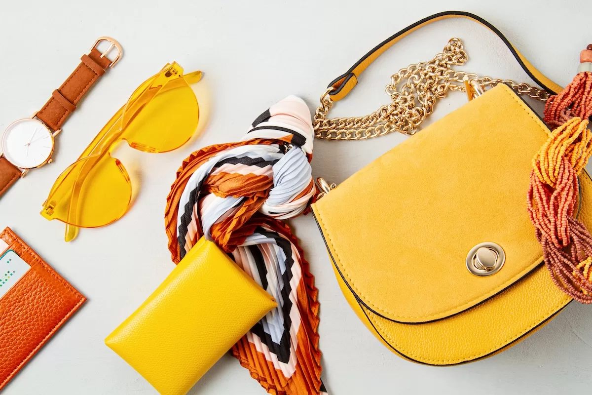 Flat lay with woman fashion accessories in yellow colors. Fashion blog, summer style, shopping and trends idea Flat lay with woman fashion accessories in yellow colors. Fashion blog, summer style, shopping and trends concept